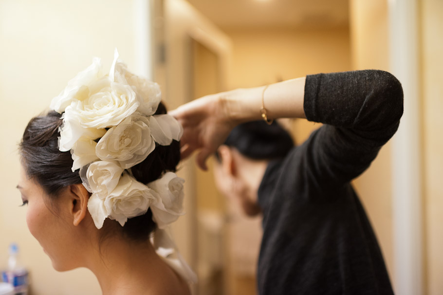 Bride getting hair done with some serious deco