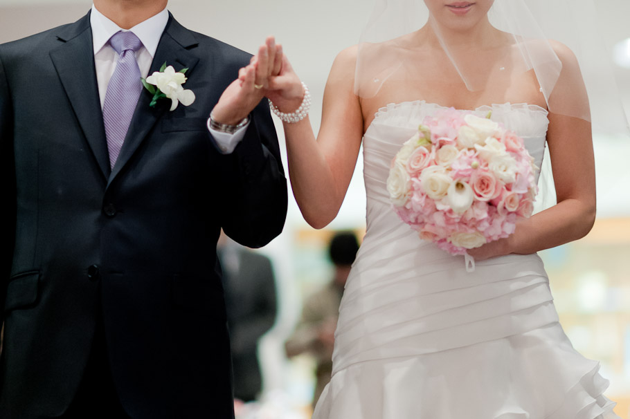 Bride's father walking her down the aisle